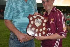 17-North-Mayo-Bord-Na-nog-Chairman-Ml-McKenzie-presenting-North-Mayo-U14A-Shield-to-Crossmolina-Captain